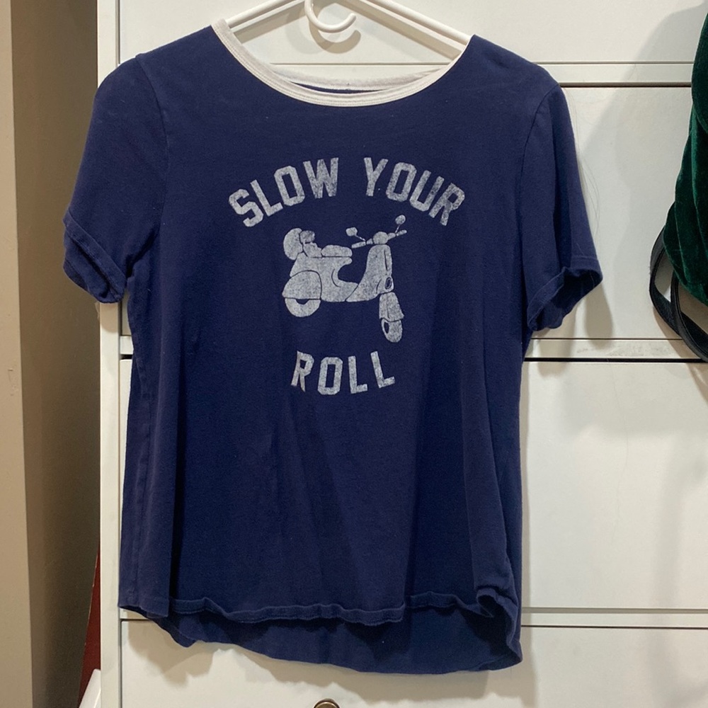 Blue “Slow your roll” Tee.